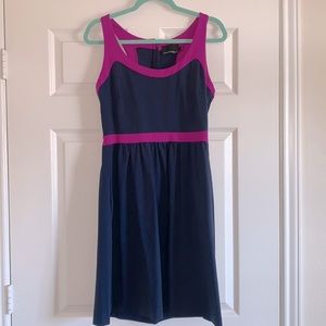 Navy dress with purple trim and pockets